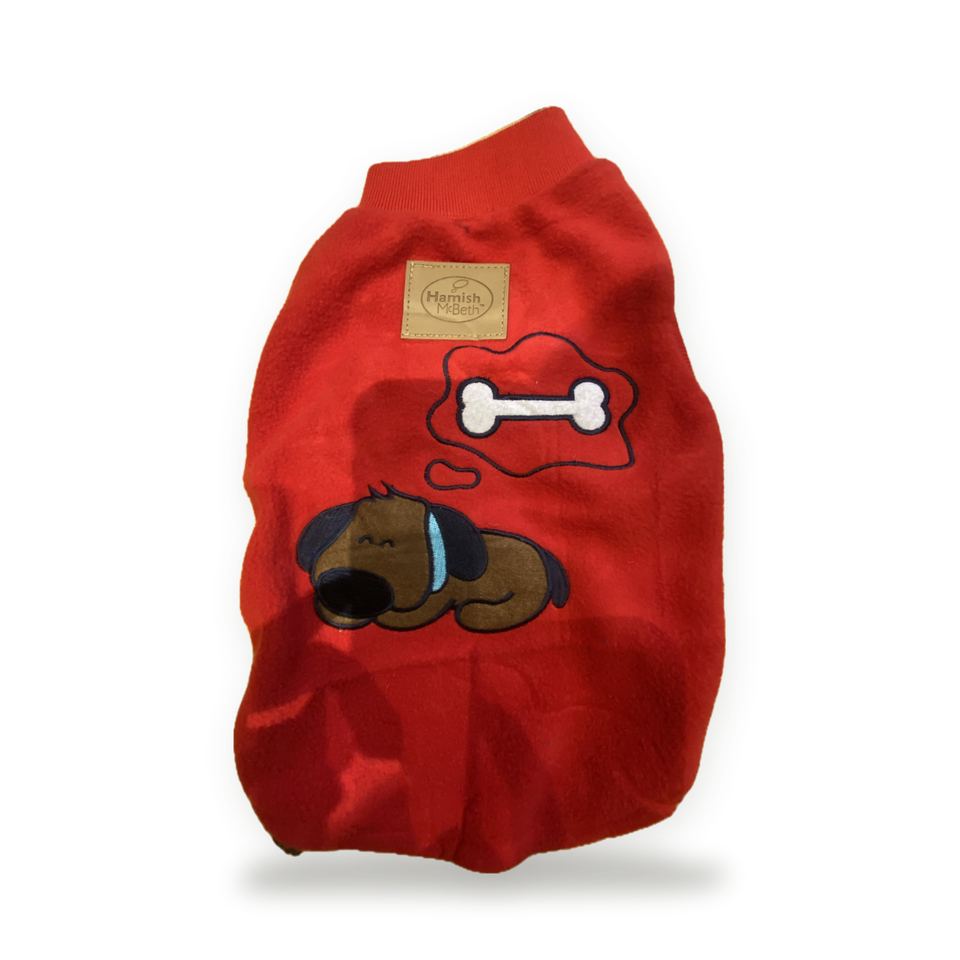 A red Hamish McBeth dog jumper with an embroidered sleeping dog and bone