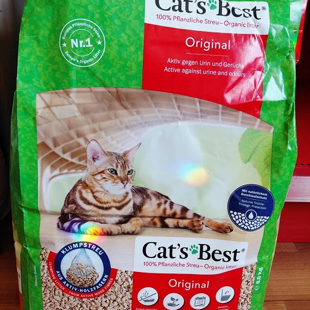 A bag of Poo Wee recycled paper cat litter